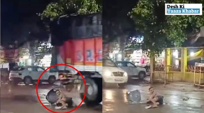 Man Sits in the Middle of the Street in Front of a Police Station, Gets Hit by Truck—Video Goes Viral